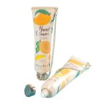 crema hidratante de manos con mango